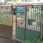 In front of and inside a car repair