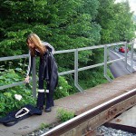 On a railway bridge above a street